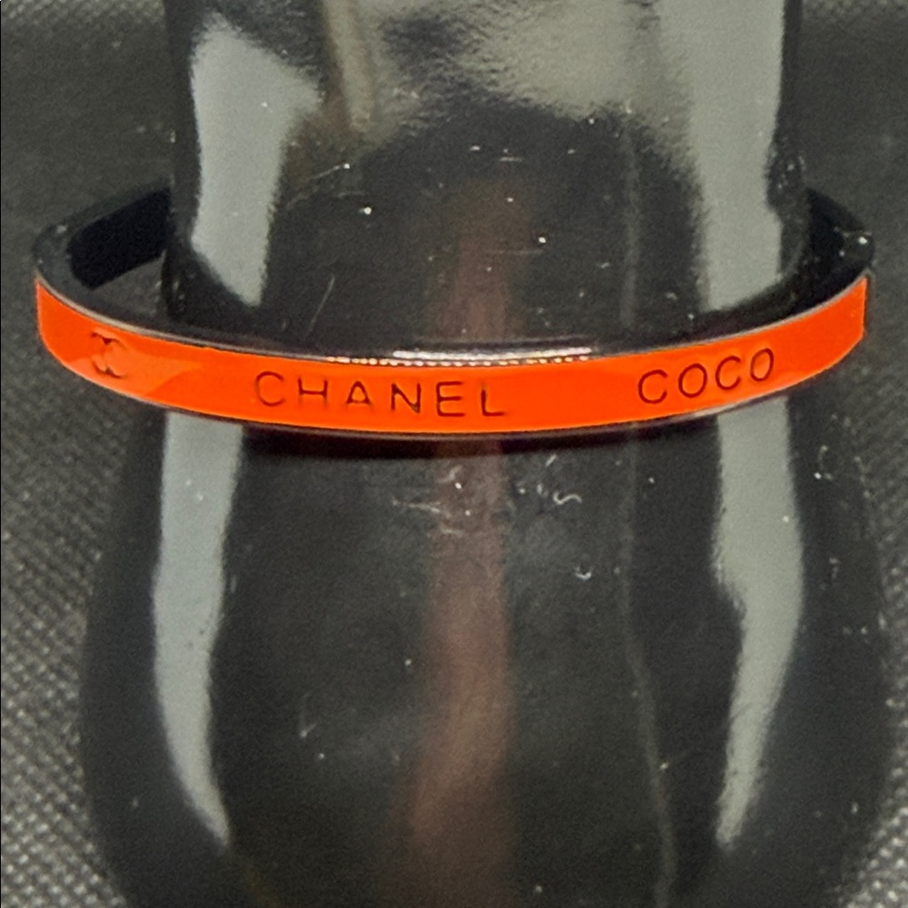 ✅ PRICE IS FIRM ✅ Fashion Black and Orange Bracelet/Bangle